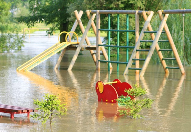 A flooded playground after severe weather